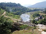 
The Bagmati River flows through the Chobar Gorge under a bridge and past the Jal Binayak Temple near Kathmandu.
